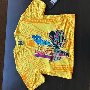 Genuine Merchandise Yellow Graphic Tee with Multicolor Design